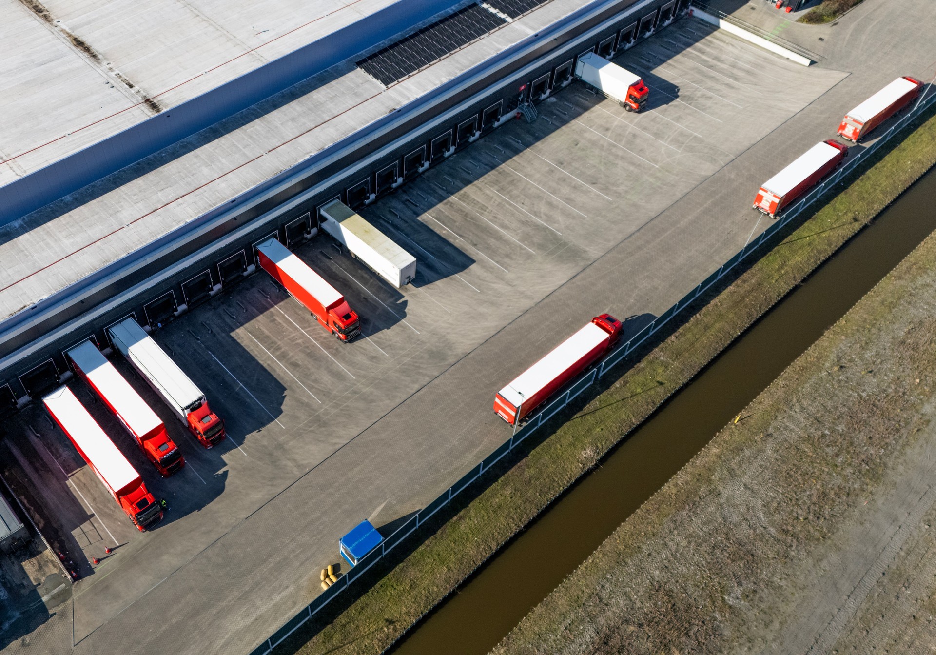 Delivery lorries at a distribution warehouse